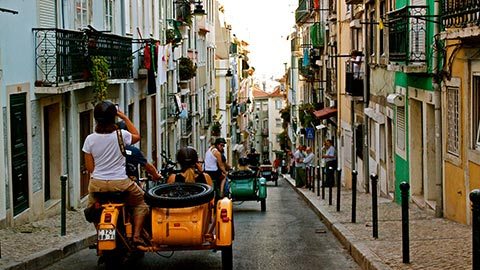 Capture Lisbon’s Beauty from a Moto-Sidecar During a Thrilling Photography Tour